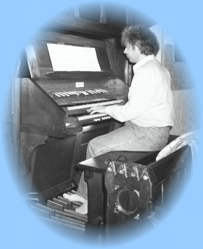 Former organist Neil Sissons at the organ.